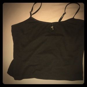 A black crop top with key charm